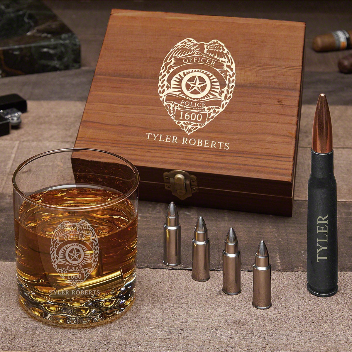23. Police Badge and Gun-Themed Whiskey Glass