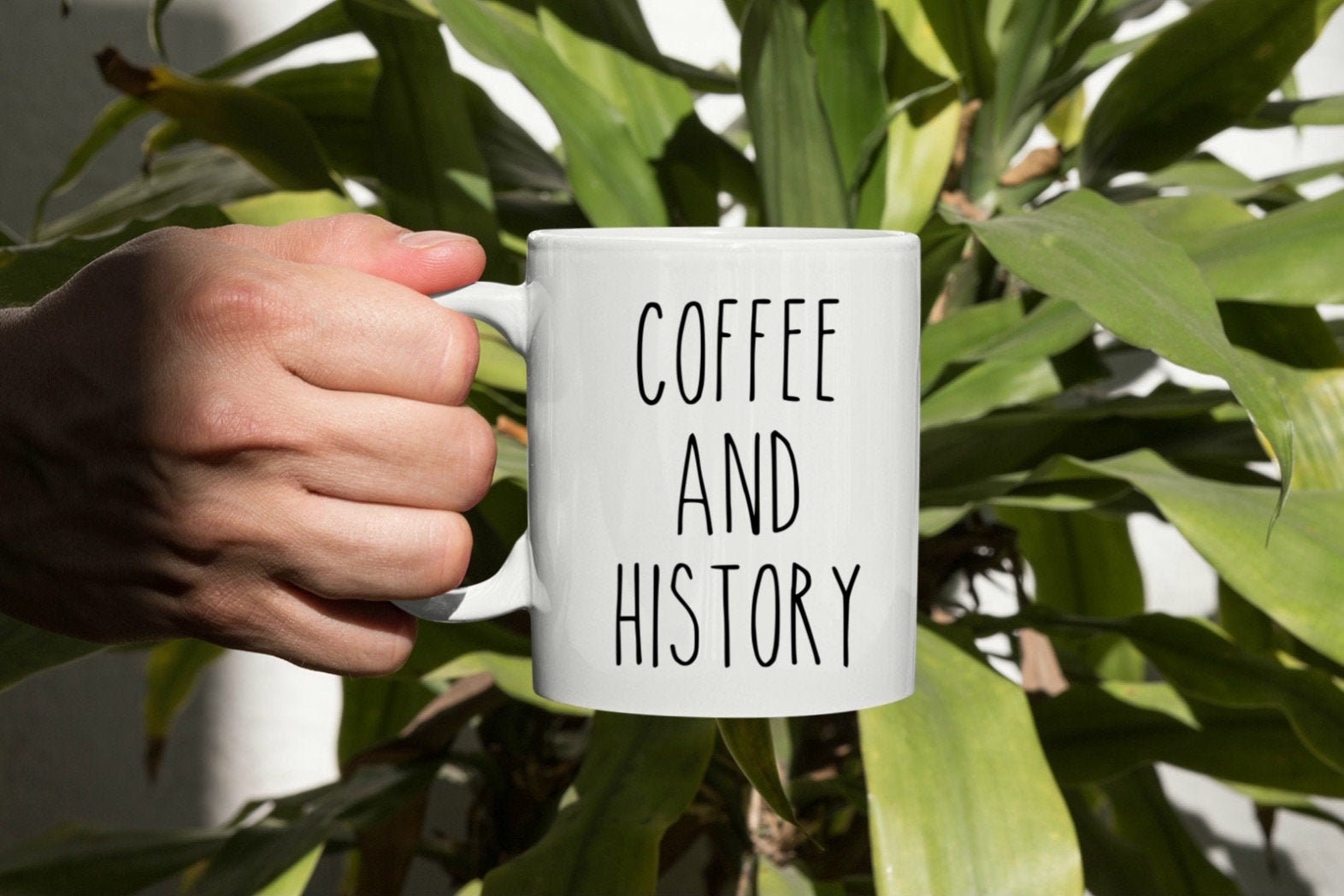 9. Coffee And History Mug
